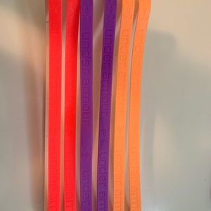 6 rubber Under Armour headbands